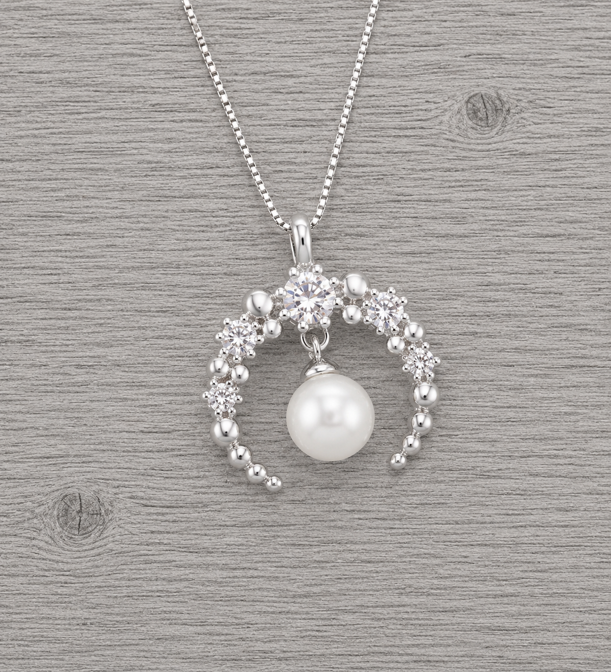 New Moon Sterling Silver Pendant with CZ